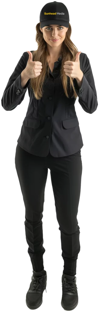 a woman wearing a Sunhead Media hat with two thumbs up